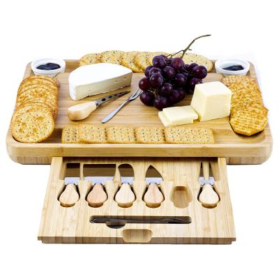 China Sustainable Amazon Markets Blocks Wooden Chopping Board Bring Sauce Cups And Knives Bamboo Cheese Board for sale