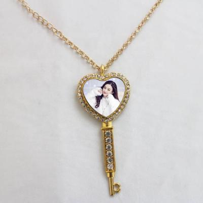 China Environmental Friendly Heart Sublimation Necklace Heat Transfer Mute Key Pendant Necklace for sale