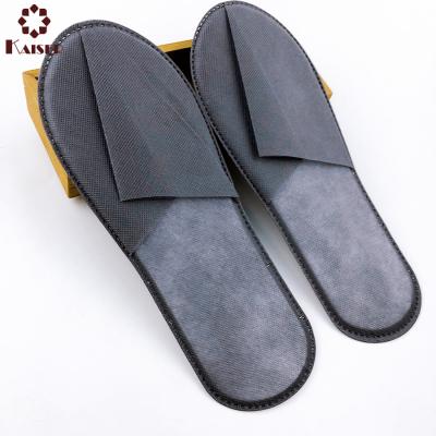 China Custom Dark Gray Disposable Nonwoven Hotel Slippers for sale