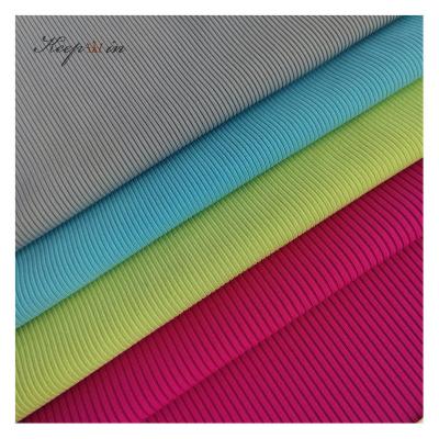 China 2*2 anti pill rib 2*2 jacquard fabric hand feel yoga hin thin fabric high elastic cool soft swimsuit tank top fabric for sale