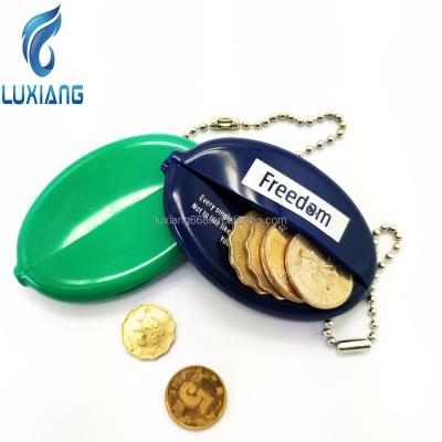 China Waterproof Custom Logo Fashion Squeeze Coin Purse Holder Silicone Coin Case Promotion Change Rubber Holder for Keys and Bags for sale