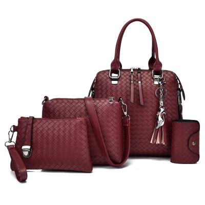 China Other hot sale big PU 4pcs cheap leather women fashion purse set 2023 new style tassel handbag for ladies for sale