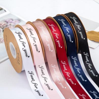 China Single Side Ribbon Strap Gold Foil Printed Logo Gift Goods 2.5cm Polyester High Quality Custom Ribbon Satin for sale