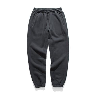 China Custom Anti-wrinkle sweatpants high quality padded sports tracksuit for cold weather men jogger pants for sale