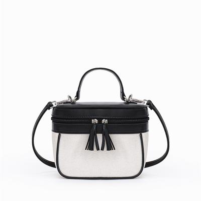 China 2022 new fashion design women cross - the simple black and white bucket body bags Tote Bag for sale