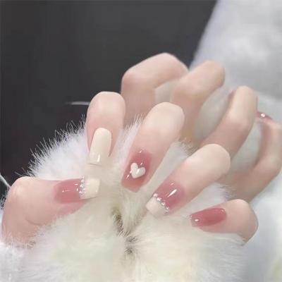 China Salon Effect Pink Reusable Nude Fake Nails Luxury Designed Short Custom Acrylic Press On Nails Artificial Nails For Woman for sale