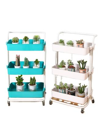 China Sustainable Movable 3-Tier Cart Storages Rotating Racks Racks Kids Toys Food Toiletries Shelving Storage With Wheels for sale