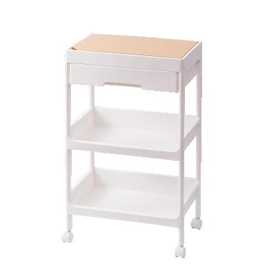 China Modern Modern Style PP and Material White 3 Tier MDF Kitchen Storage Shelf Rack with Cover, Wheels and Drawer for Home for sale