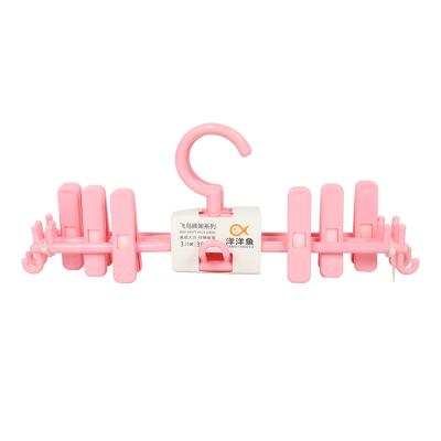 China Modern Wholesale Most Popular Product White And Pink Plastic Pants Hanger For Drying Cloths for sale