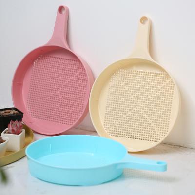 China Modern Plastic Garden Sieve Enigma Green For Soil Stone Mesh Gardening Tool for sale