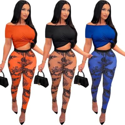 China Reversible newcomers spring women outfits print crop top t-shirt and leggings matching casual two-piece pants set sets women outfits for sale