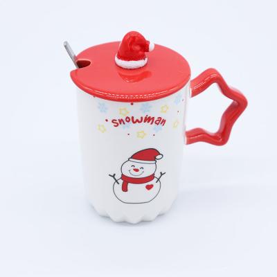 China Wholesale Nordic Viable Snowman Pattern Christmas Coffee Mug Porcelain Ceramic Mug With Star Handle And Christmas Hat Lid for sale