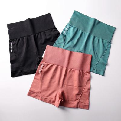 China Sustainable Women's High Waist Yoga Shorts Solid Color Seamless Workout Running Sports Shorts Yoga Leggings Short for sale