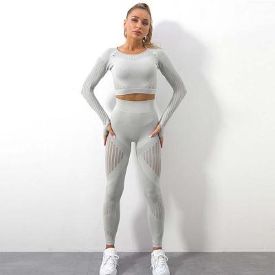 China Minpai Breathable Seamless Knitted Yoga Suit Set Hollow Out Breathable Fitness Yoga Suit For Ladies for sale