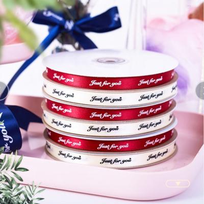 China Wholesale Viable Satin Printing Ribbon Wedding Festival Bouquet Ribbon Gift Box Packaging Decorative Ribbon for sale