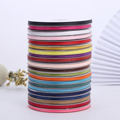 China Handmade Spot 0.6cm Polyester Satin Ribbon Diy Accessories Ribbon Textile Accessories Grosgrain Ribbon Supplier for sale