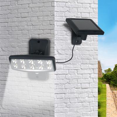 China Garden LED Wall Lamp Sensor Security Waterproof Power Solar Garden Light For Outdoor Door for sale