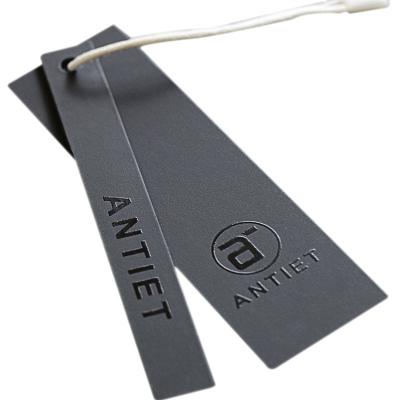 China Sustainable Custom Logo Printed Plasticrecycled Hang Tag Embossed Swing Spot Labels Paper UV Paper Hanger Tag With String For Garment for sale