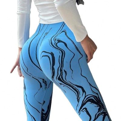 China Breathable Drop Shipping Wholesale Colorful Seamless Tie Dye Yoga Pants Peach Buttocks Workout Naked Feeling Tight Gym Gaiters for sale