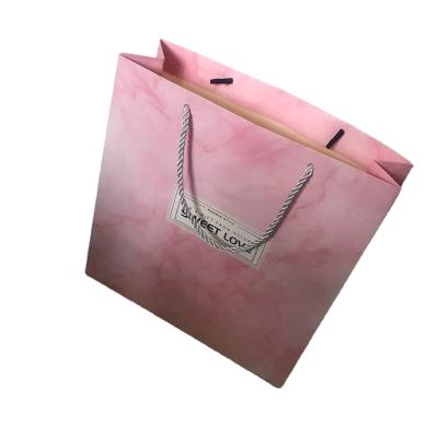 China Eco-friendly wholesale printed grain takeaway food packaging copper dish cheap twisted shopping paper bag for sale