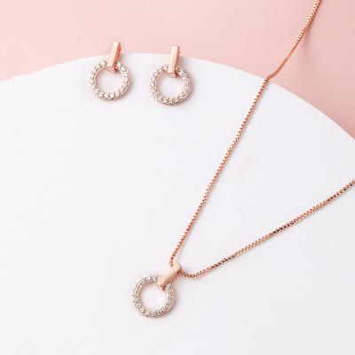 China Xinting Round Ring Micro Inlaid Zircon Rose Gold Environmental Friendly Pendants For Ladies Custom Necklaces Set With Earrings for sale