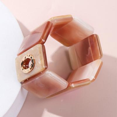 China Environmental Friendly Vintage Wide Hollow Sparkle Orange Pink Acrylic Bracelets For Girls Chunky Bracelet Women for sale