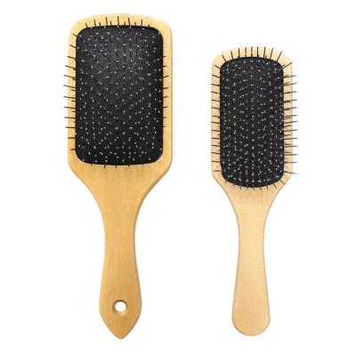 China New Massage Home Wooden Hair Brush With Metal Pins Message Steel Comb With Cushion Black Health Air Paddle Detangling Wooden Comb for sale