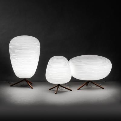 China Modern simple milk white spiral pattern led coffee table light lead glass bedside table light for sale