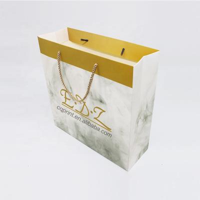 China Luxury Eco-Friendly Color Carrier Gift Bag With Handle Logo Printed Paper Wedding Kraft Marble Custom Small Paper Offset UV Printing Accept for sale