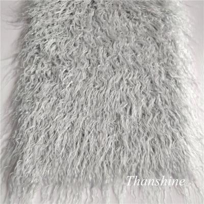 China Hipile Flame Retardant Faux Plush Long Pile Mongolian Lamb Fur Fabric For Women Coat Jacket for sale