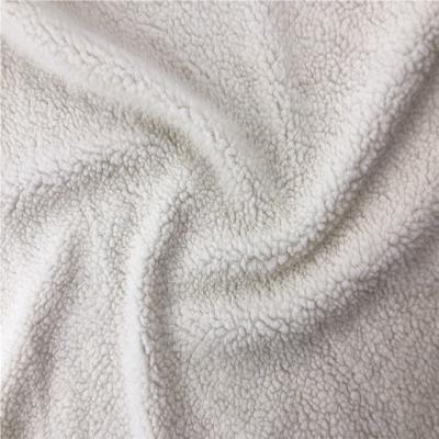 China Auto Upholstery Sherpa Fur Fabric Fleece 100% Polyester For Garment Or Lining Or Toy for sale