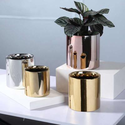 China Modern Silver Gold Glazed Decorated Ceramic Flower Planter Pots For Indoor Plants for sale