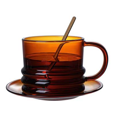 China Sustainable Hot sale thick colored glass coffee cup high borosilicate heatproof glass cup household with saucer tea cup for sale