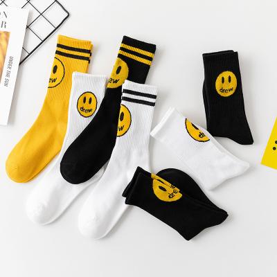 China Sporty Men Shape Bieber Smiley Face Embroidered Crew Socks Sports Fashion Street Socks Cotton Crew Socks for sale