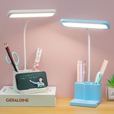 China ABS Hot Modern Creative Eye Protection Folding Desk Lamp Study Reading LED Table Lamp With Pen Holder Office Bedroom Night Lamp for sale