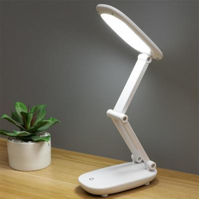 China Modern New folding reading lamp rotatable three gear dimming USB charging led touch control desk lampl for sale