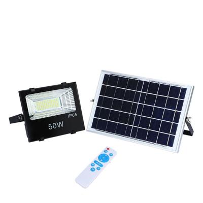 China Garden Panel Charged Battery Stock Energy Saving Silver Road Wall 50w Led Solar Flood Light for sale