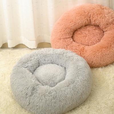 China Stocked Long faux fur pet bed waterproof plush donut round dog bed soft washable cheap dog pet cat cushion bed for sale