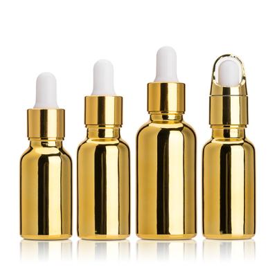 China High Grade Personal Care Gold Color Essential Oil Dropper Bottles Skin Care Essence Bottle 1oz Glass Bottle For Essential Oil for sale