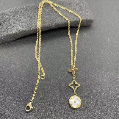 China 2021 TRENDY new classic set stainless steel pendant necklace clover tassel necklace turquoise inlaid with 18K gold plating for sale