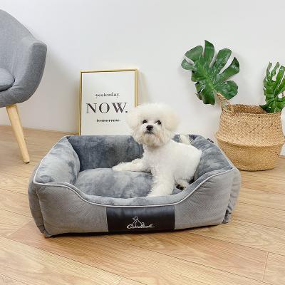 China Waterproof Luxury Rectangle Pet Bed Super Soft Cuddler Dog Bed for sale