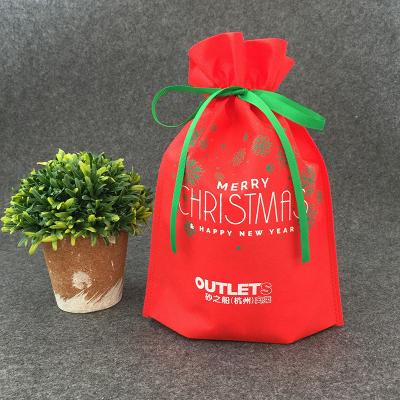 China Eco-Friendly Custom Logo Printed Christmas Gift Non Woven Fabric Bag With Drawstring Closure for sale