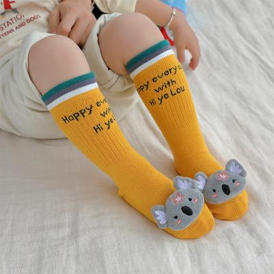 China Newborn Baby Cotton Cartoon Doll Socks Breathable Long Tube Socks for sale