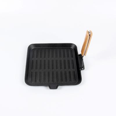 China Traditional Non-Stick Frying Grill Pan With Folding Wooden Handle Barbecue Pan Vegetable Oil Cast Iron for sale