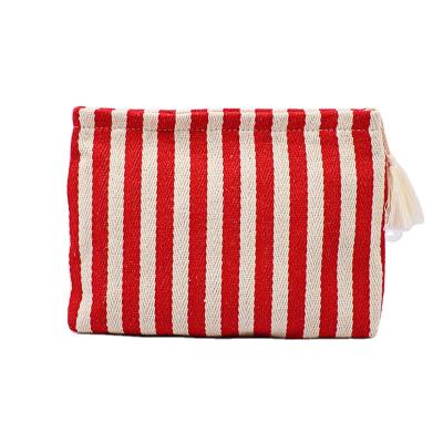 China Durable Lady Stripe Tassel Recycled Canvas Custom Cosmetic Bag for sale