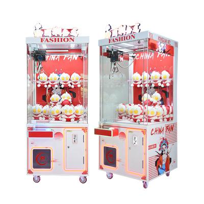 China Metal+acrylic+plastic+wood professional gift country metal+acrylic+plastic+wood professional gift doll claw plush toy coin toy vending machine table clamshell-staple machine for sale