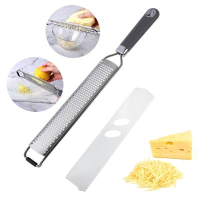 China Sustainable Premium Kitchen Instruments Cheese Grater Stainless Steel Cheese Grater Shredder With Handle for sale