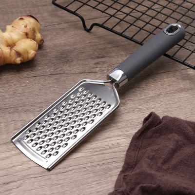 China Home Kitchen Multifunctional Metal Stainless Steel Lemon Zester Cheese Handheld Grater with Non-slip Pipe Handle for sale