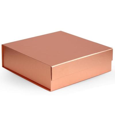 China Exclusive Recycled Materials Gold Paper Box Clothing Book Style Packaging Gift Boxes With Magnetic Lid for sale