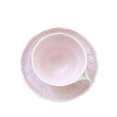 China Sustainable Wholesale 200ML Pink Embossed Rose Porcelain Coffee Cup And Saucers With Handle for sale